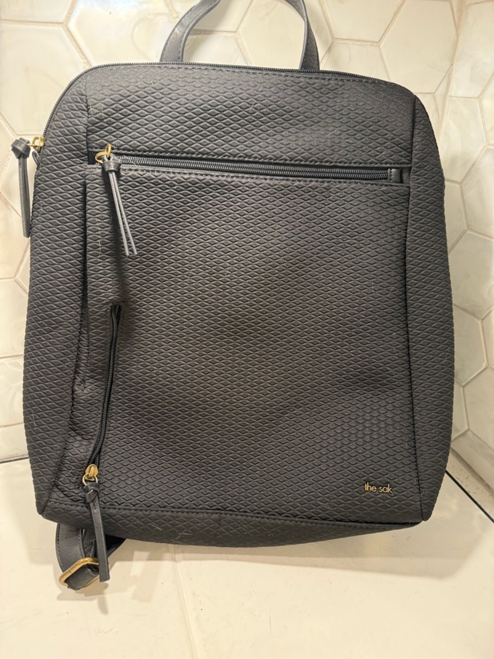 The Sak Olvera Metro Backpack NWT Black Embossed Fabric Adjustable Goldtone